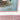 Still life painting of roses in a rosy pink frame - 1980s vintage - NextStage Vintage