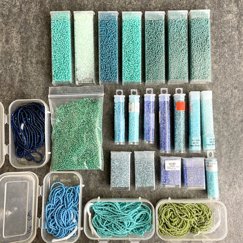 600 grams of 11/0 round seed beads - blues and greens - destash lot