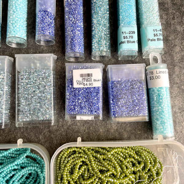 600 grams of 11/0 round seed beads - blues and greens - destash lot