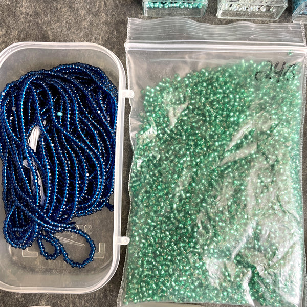 600 grams of 11/0 round seed beads - blues and greens - destash lot