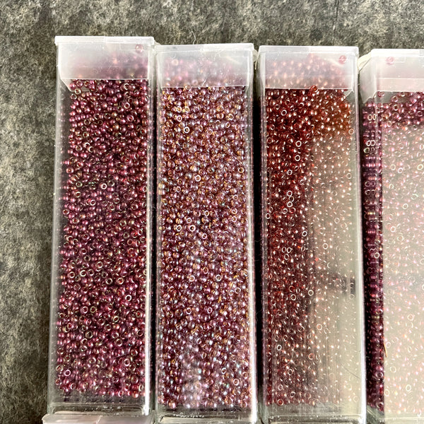 850 grams of 11/0 round seed beads - earth tones - estate destash lot