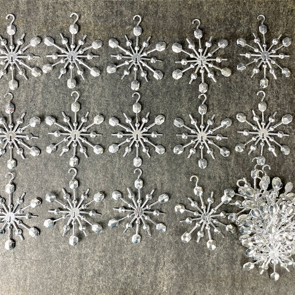 Plastic silver snowflake ornaments - set of 22 - 1960s vintage - NextStage Vintage