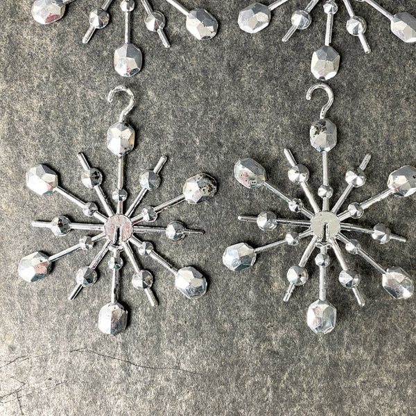 Plastic silver snowflake ornaments - set of 22 - 1960s vintage - NextStage Vintage