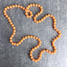 Tangerine orange plastic beaded rope necklace – 60s vintage - NextStage Vintage