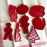 Tupperware red cookie cutters - set of 8 - holiday motifs - NextStage Vintage