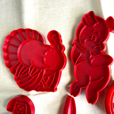Tupperware red cookie cutters - set of 8 - holiday motifs - NextStage Vintage