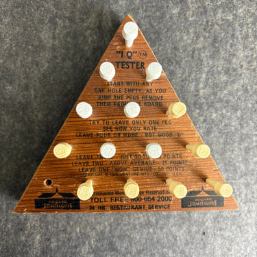Pair of 1970s logic puzzles - Needle's Eye and Howard Johnson's IQ tester