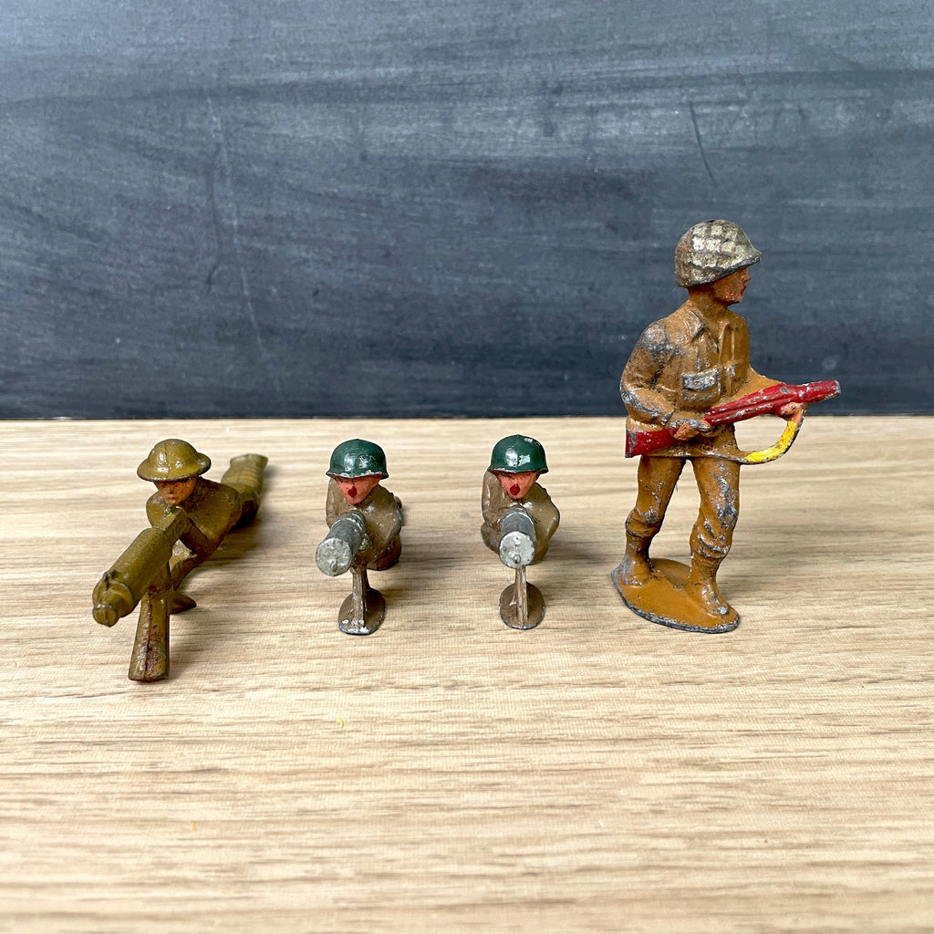 Lead and cast iron vintage dime store soldiers - group of 4 | NextStage ...