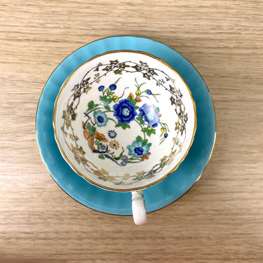 Aynsley turquoise tea cup with floral lining - NextStage Vintage