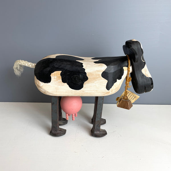 Folk art wooden holstein cow with iron spike legs - made by Bob and Jean Rich - 1980s vintage - NextStage Vintage