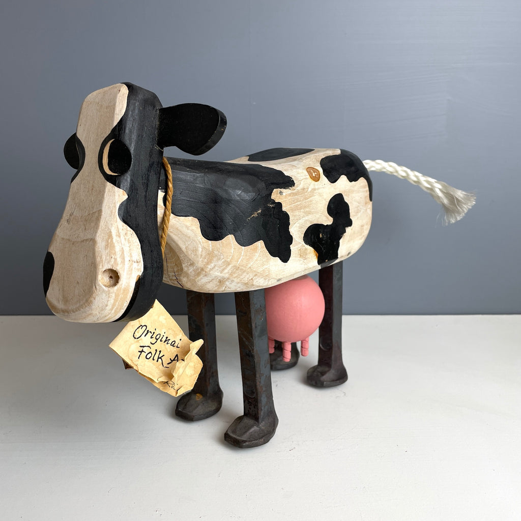 Folk art wooden holstein cow with iron spike legs - made by Bob and Jean Rich - 1980s vintage - NextStage Vintage