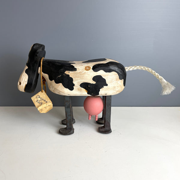 Folk art wooden holstein cow with iron spike legs - made by Bob and Jean Rich - 1980s vintage - NextStage Vintage