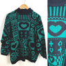 1980s acrylic black and jade patterned sweater by Stefano International -  size L - NextStage Vintage