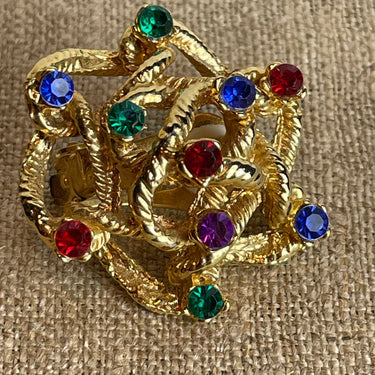 Knotted golden clip on earrings with rhinestones - 1980s vintage costume jewelry - NextStage Vintage