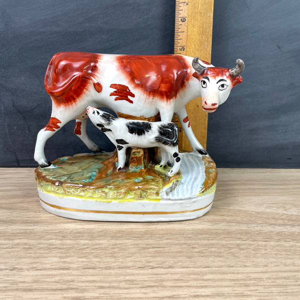 Staffordshire brown cow with black spotted calf figurine - NextStage Vintage
